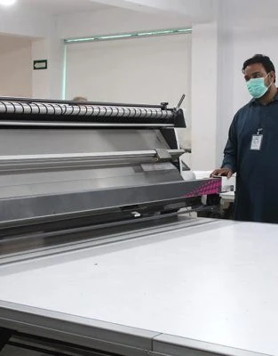 Skilled craftsmen producing premium custom fight gear in Sialkot